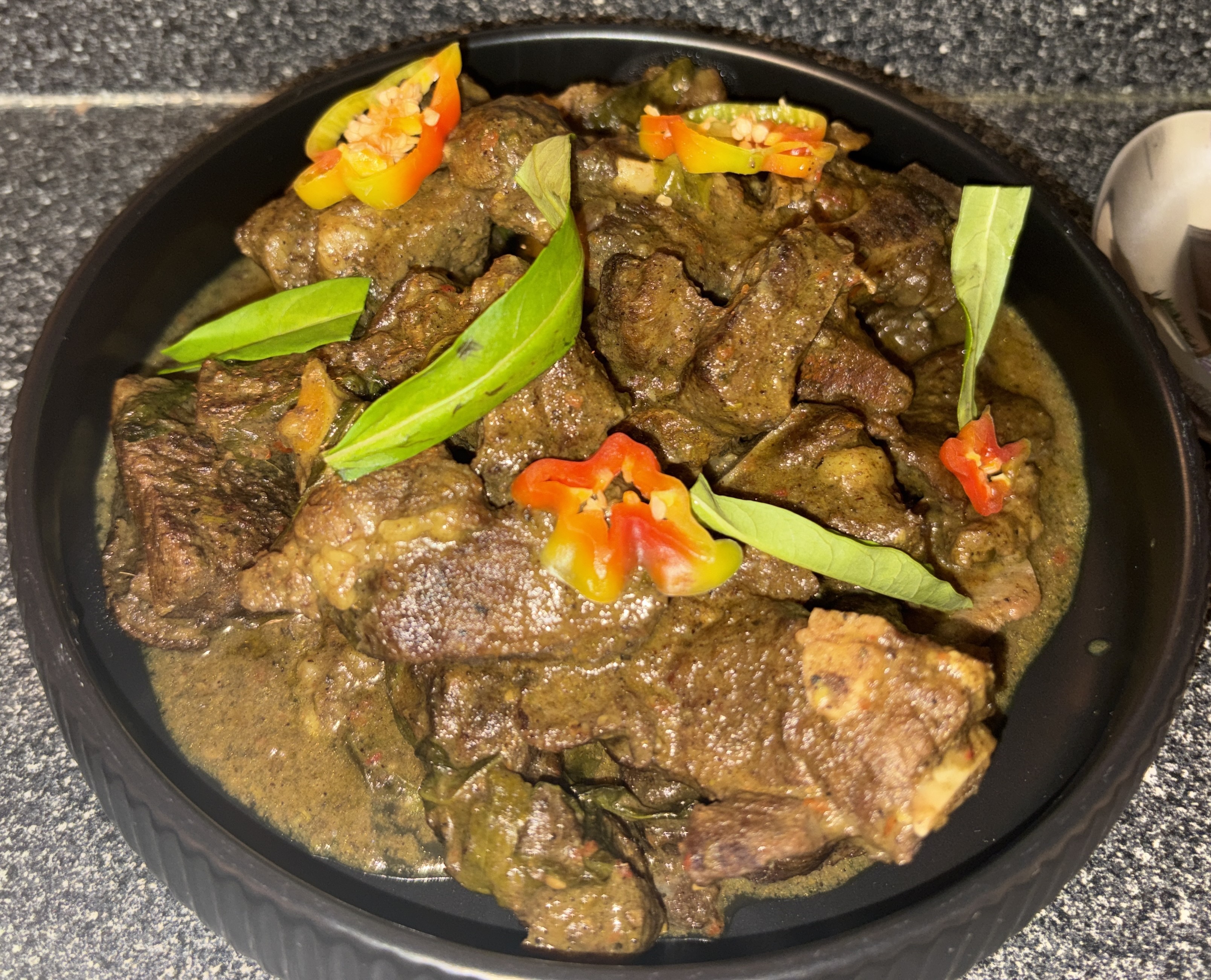 Family-style Tarragon Curry Goat